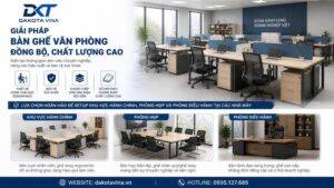Một bộ bàn ghế làm việc văn phòng hiện đại bao gồm một chiếc bàn gỗ mặt màu sáng với khung chân sắt chữ U màu đen vững chắc. Cạnh bàn là một chiếc ghế xoay văn phòng có tựa lưng bằng lưới màu đen, đệm ngồi dày và chân xoay năm cánh